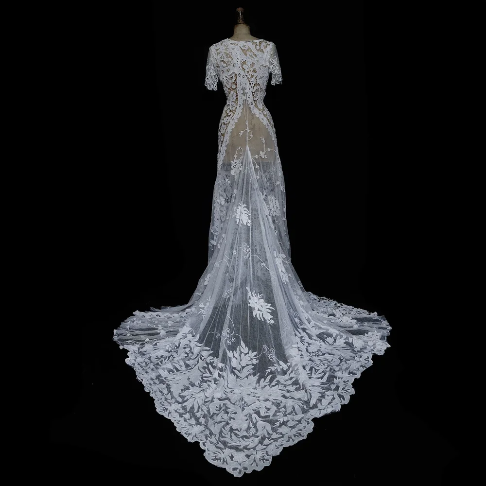 Heavy, Embroidered, White Lace Gown with Dramatic Train  jane bourvis