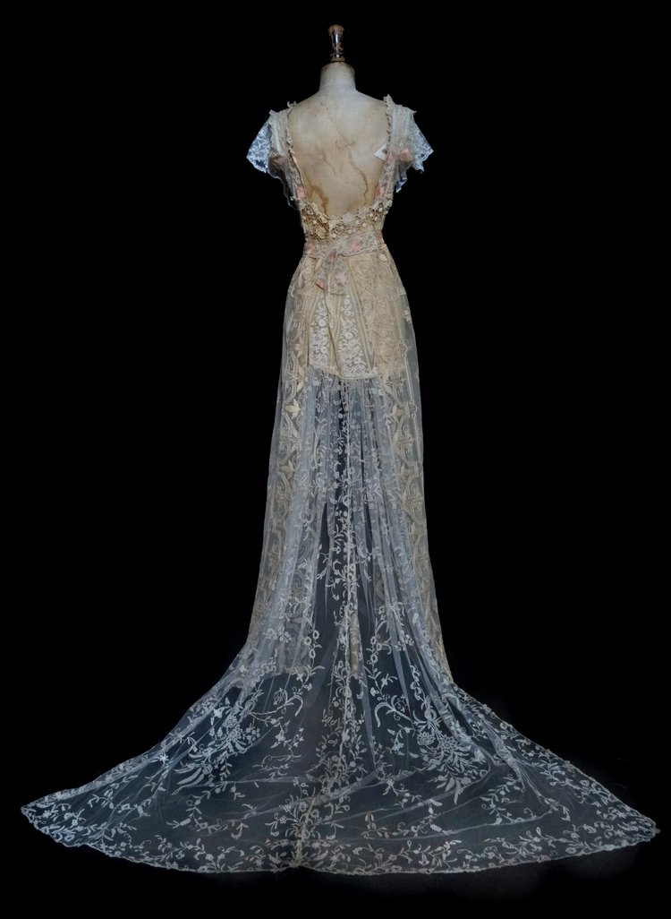 Warm coloured vintage and antique lace wedding dress.  jane bourvis