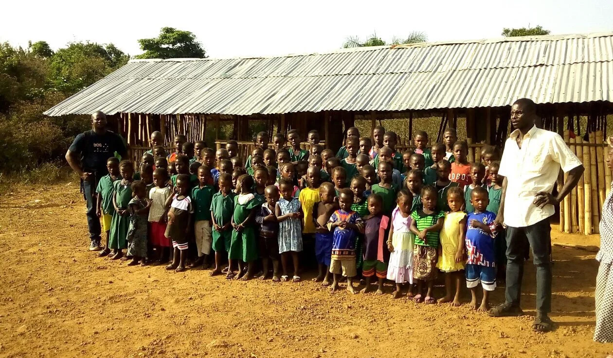 The Bradford school class in front of the old school building.