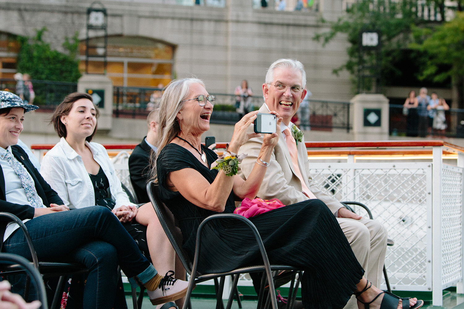 bride-parents-taking-photos-ceremony.jpg