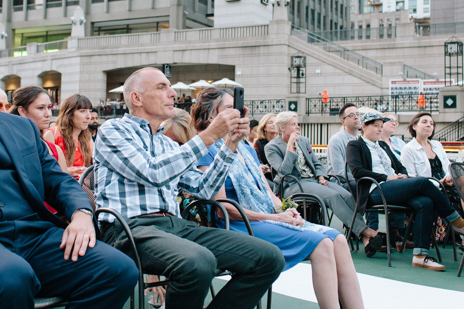 groom-parents-photographing-ceremony.jpg