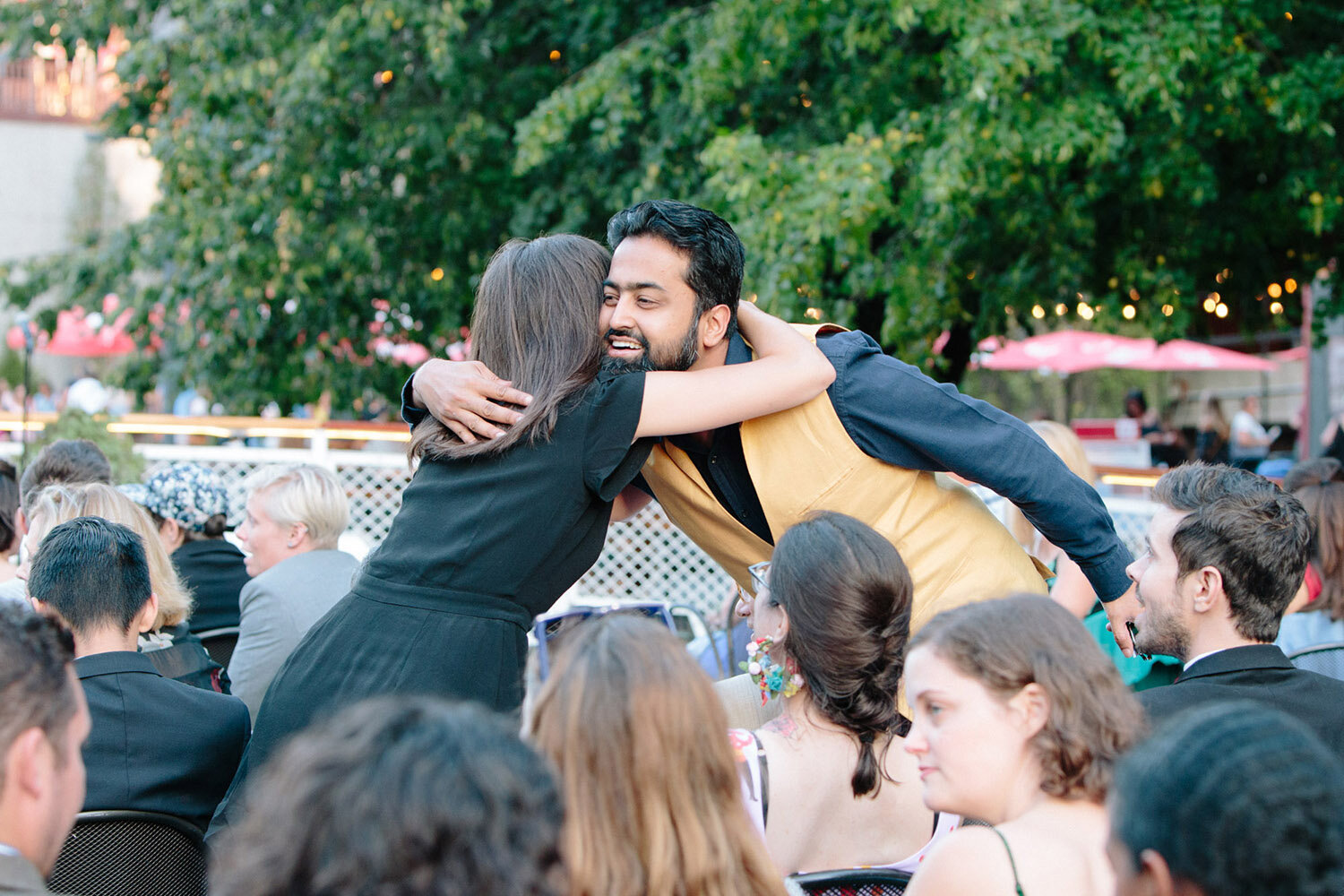 wedding-guests-hugging-on-chicago-boat.jpg