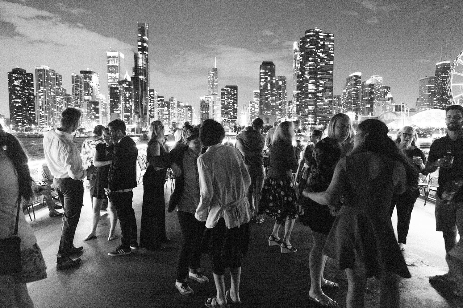 wedding-guests-dance-on-boat-chicago-skyline.jpg