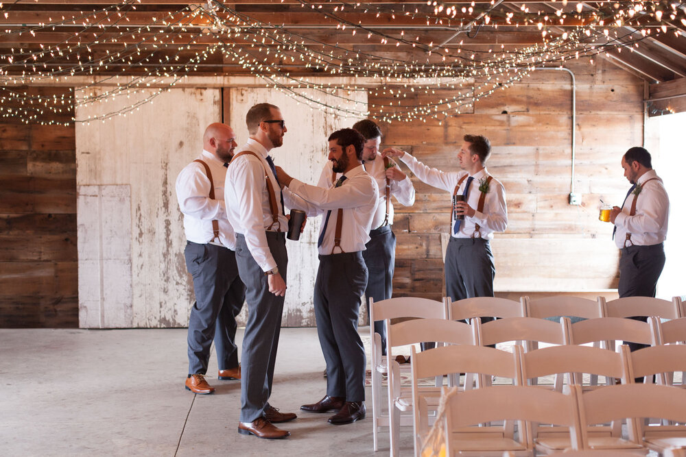 groomsmen-getting-ready-heritage-prairie.jpg
