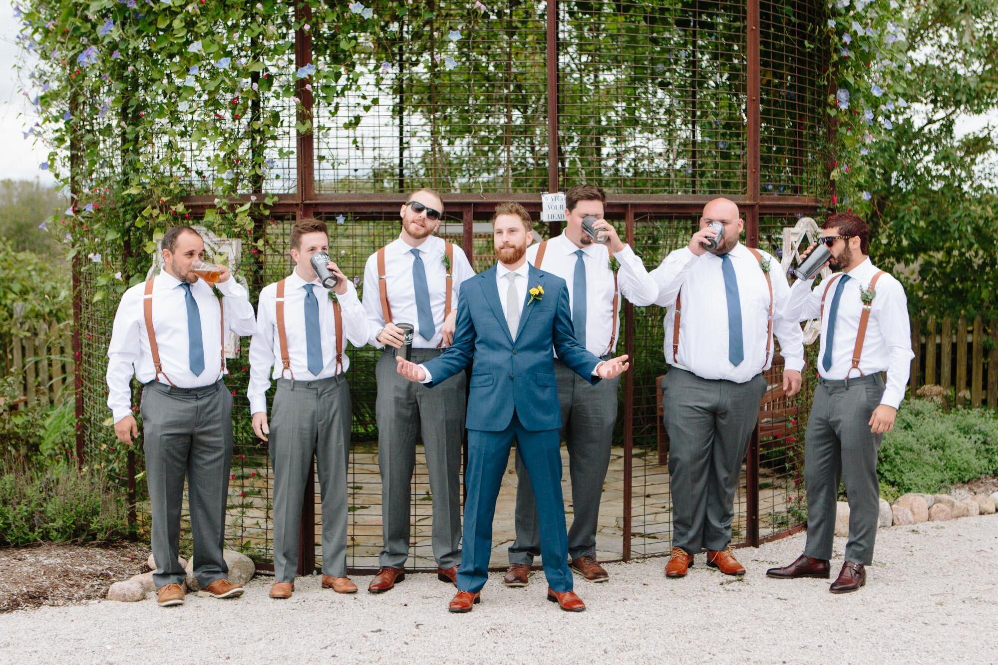 groomsmen-group-heritage-prairie-farm-wedding.jpg