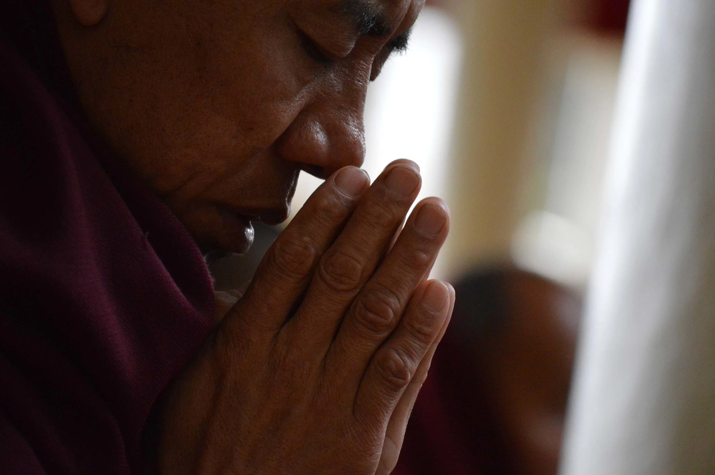 Yeshi praying.jpg