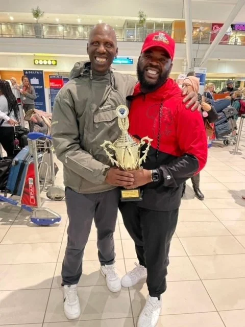 with Kenny and trophy.jpeg