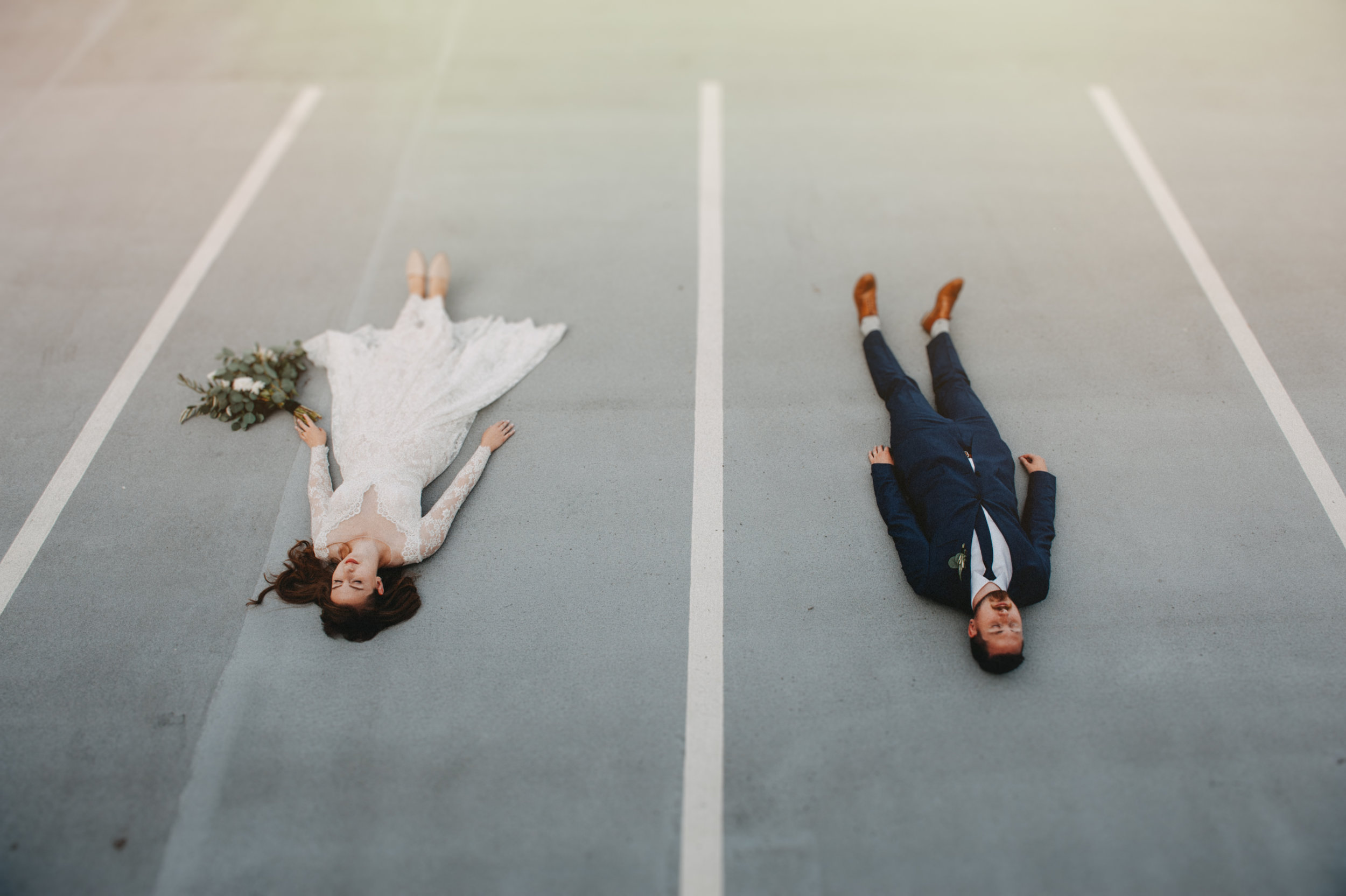 Vancouver Wedding Photographer - Artistic Bride And Groom Lying On The Ground