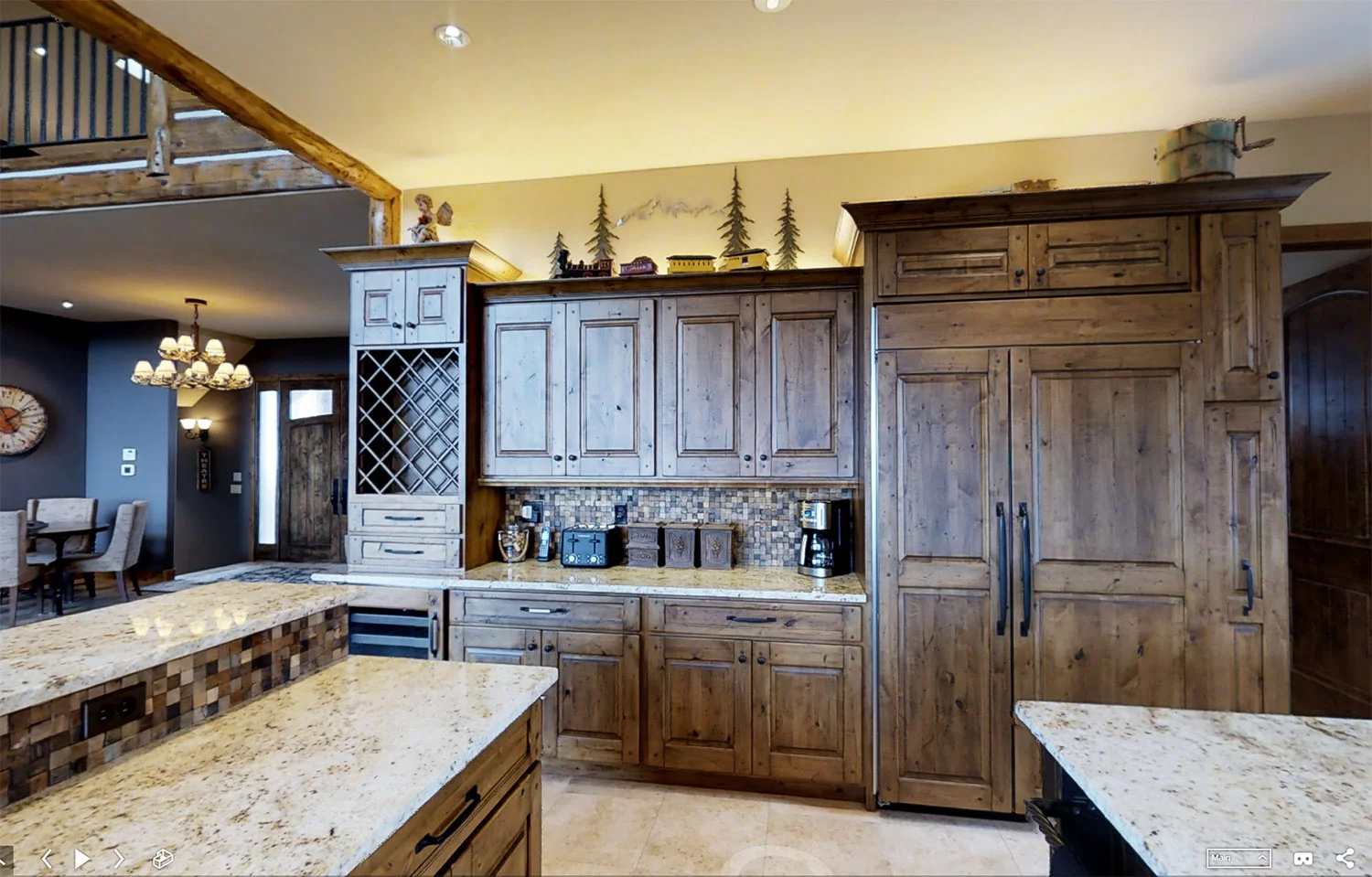 Colorado-lodge-gourmet-kitchen-builtin-refrigerator-knotty-alder-cabinets.jpg