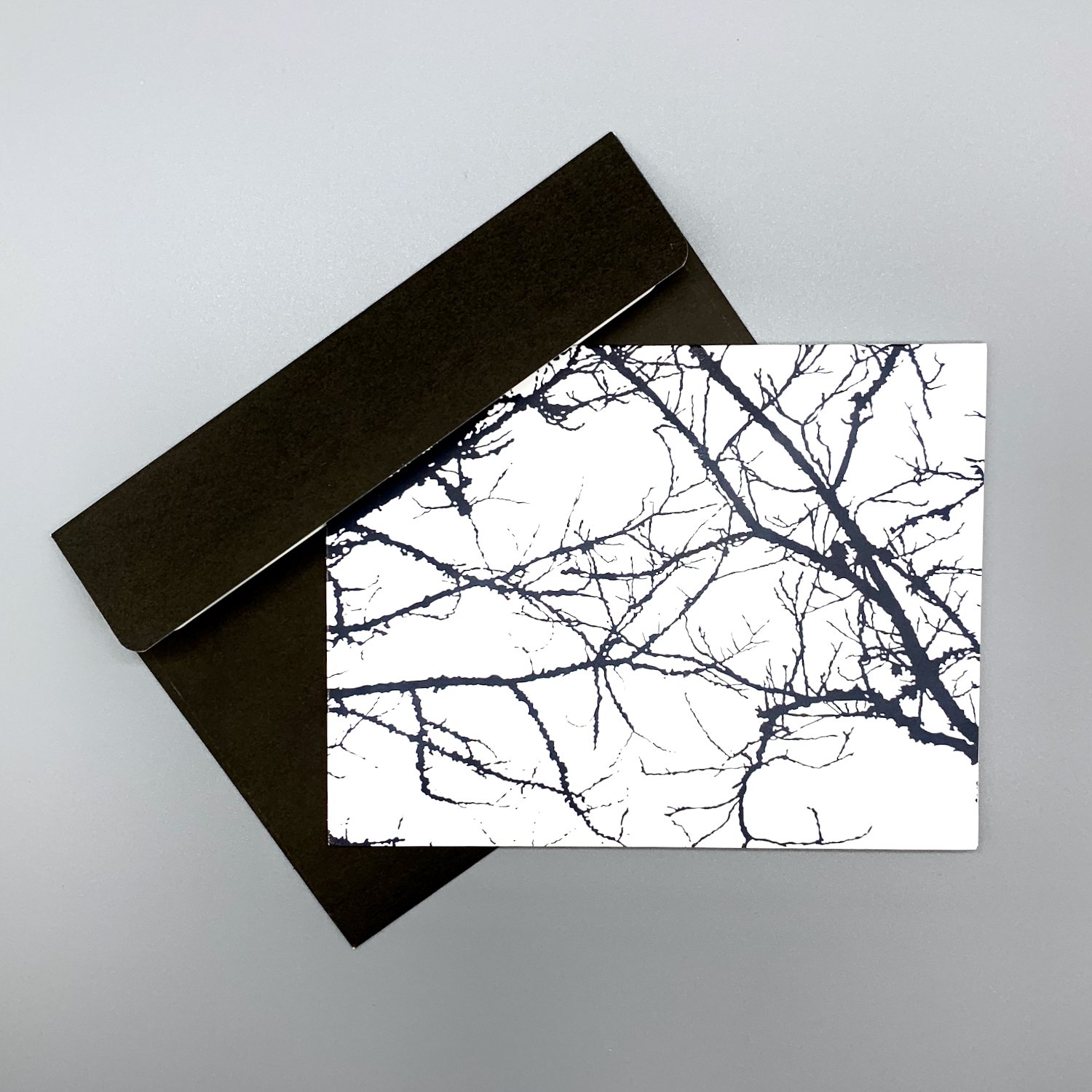 merch-walnut-notecard-envelope-black.jpeg