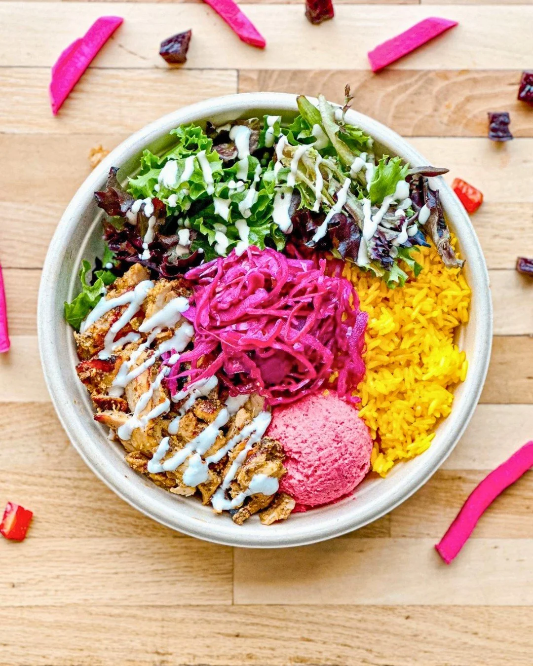 Back to work? Back to school?
Back to reality? 🥲

At least lunch still slaps.
Our Chicken Shawarma Bowl comes with turmeric rice or your choice of base, roasted beet hummus or your choice of any of our house-made hummus flavours and toppings of your