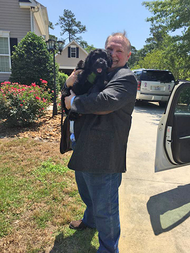 Proud new dad with baby Lincoln (Guardian Bears Diamond In the Ruff)