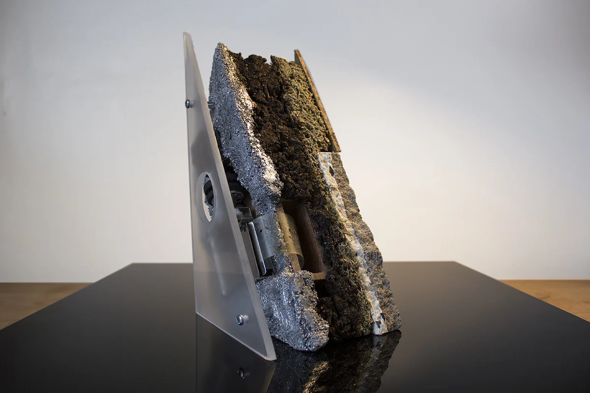    This Too Will Stop  Music box, motor, mineral composites, soil, zinc, polymers, components 9" x 5" x 4.25" 2014 
 This is a moving sculpture with sound. View  documentation   