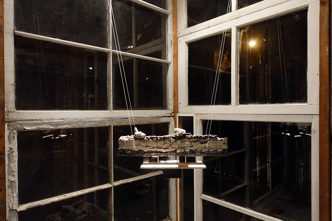    Block #8  (Installation view) 
 Mechanized sculpture with clay, dirt, pulleys, motor, brass, mirror, mixed media 
 6 x 14 x 6 in 
 2014-2016  SOLD   