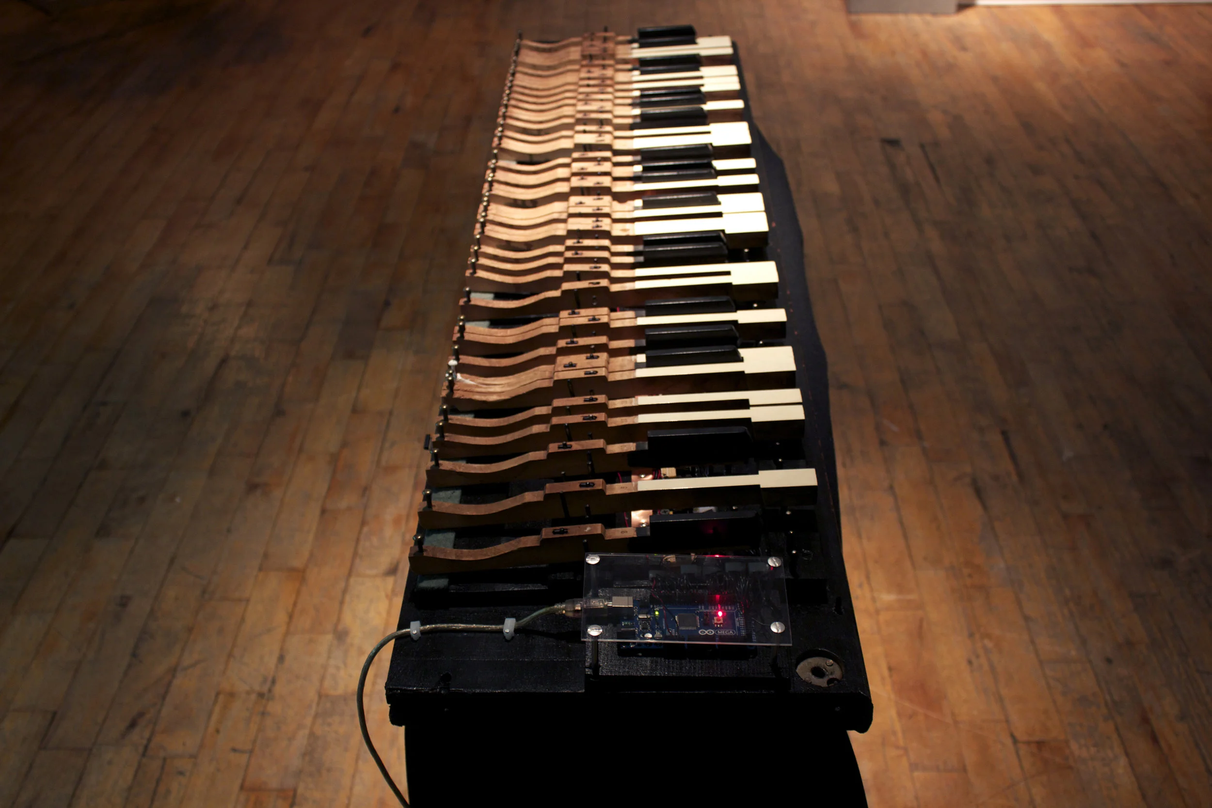   Untitled [Evil Sits on the Chest of a Sleeping Person] , completed during an artist residency at Harvestworks Digital Media Arts Center in New York [2011-2012]. Installation view, Dimensions variable  This interactive video/sound piece re-purposes 