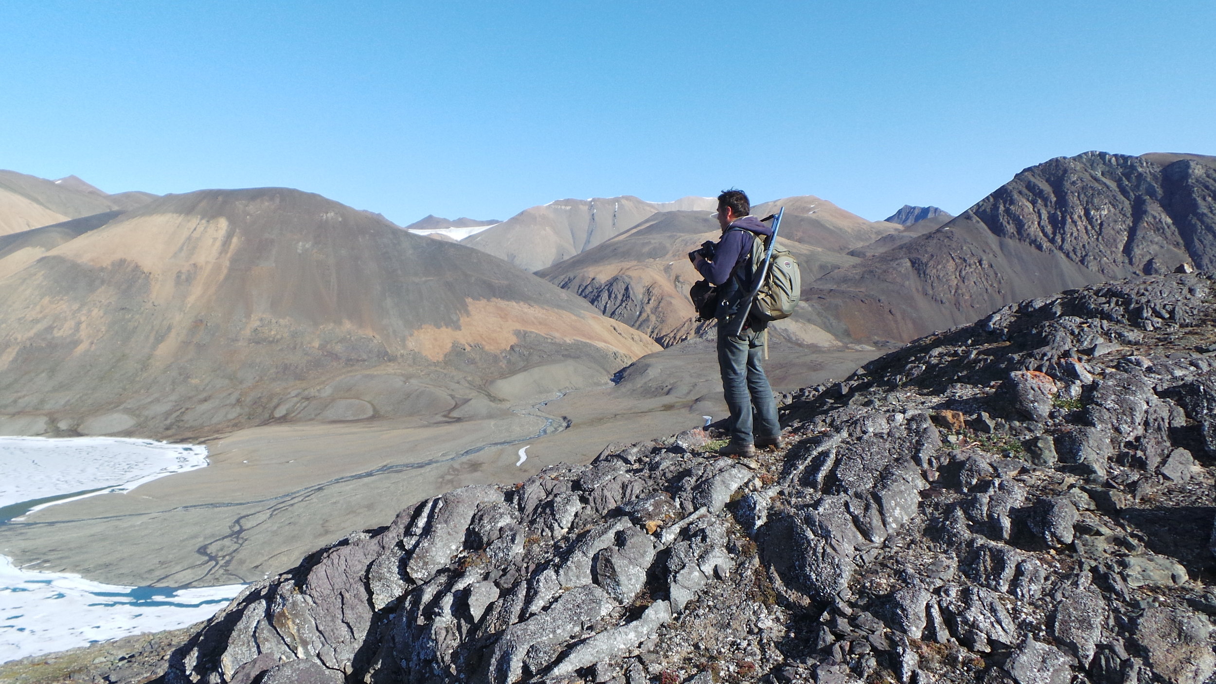 Dennis Sarrazin on a ridge on the north coast of Ellesmere Island