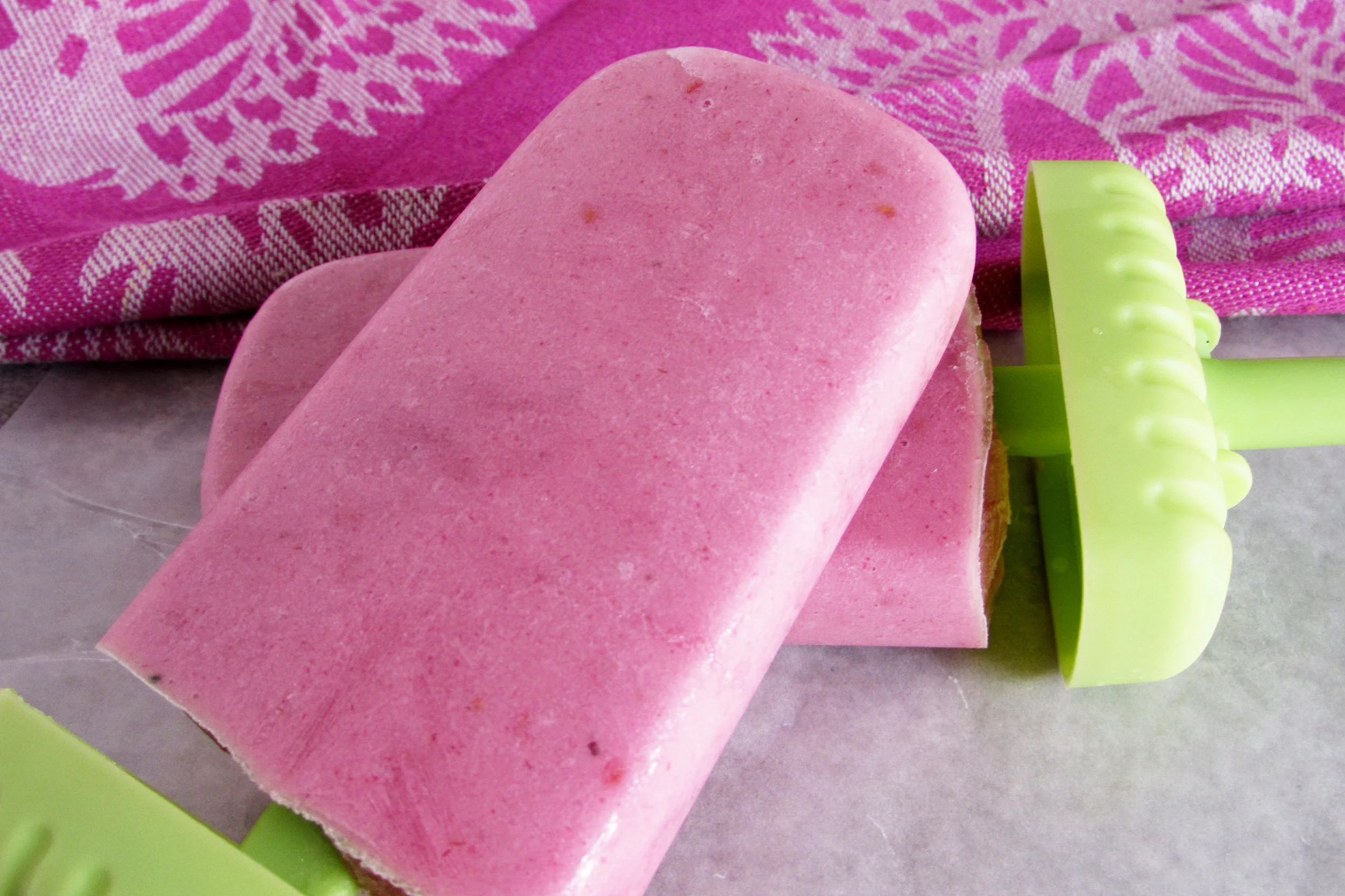 Pour smoothie into popsicle molds and freeze for a delicious and healthy snack!