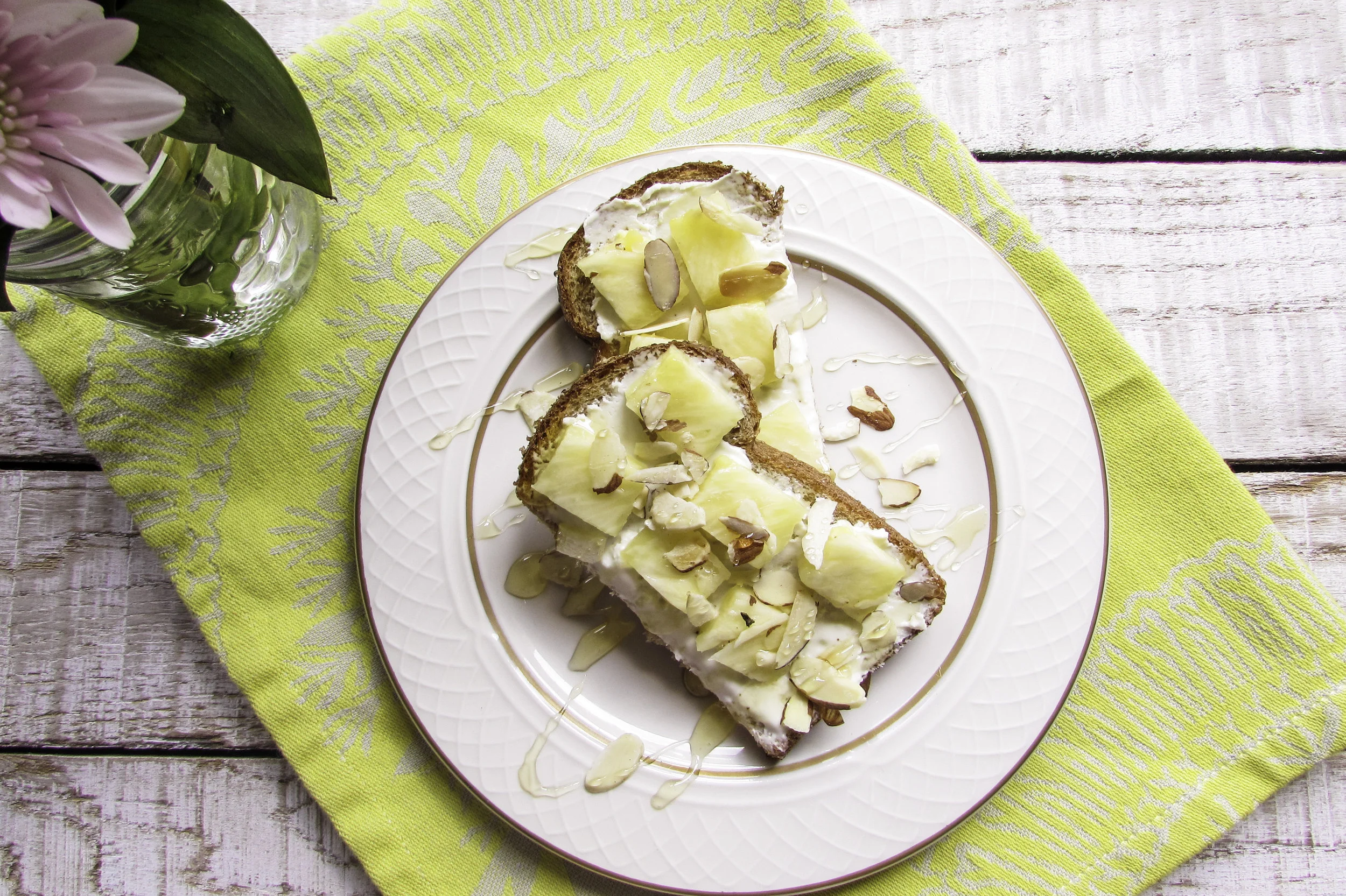 Goat cheese, pineapple chunks, sliced almonds and honey