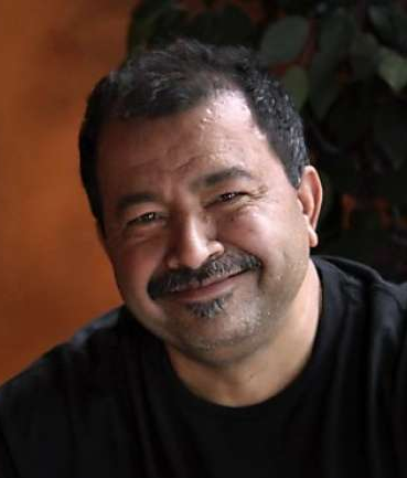 Headshot of Nick (Nakul) Sabharwal, Certified Herbal Counselor, Ayurvedic traditions educator, and founder of Cardamom & Curry.