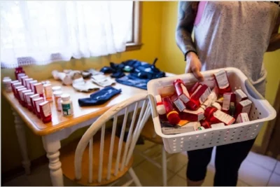 Here I display the many pharmaceutical I was prescribed and bracing I used to wear to hold me together.