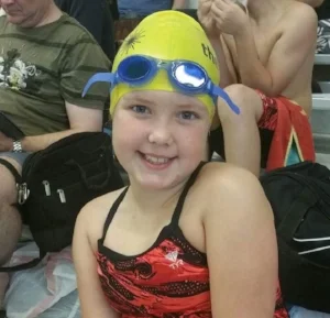 Raegan gearing up for a swim meet, Winter 2015