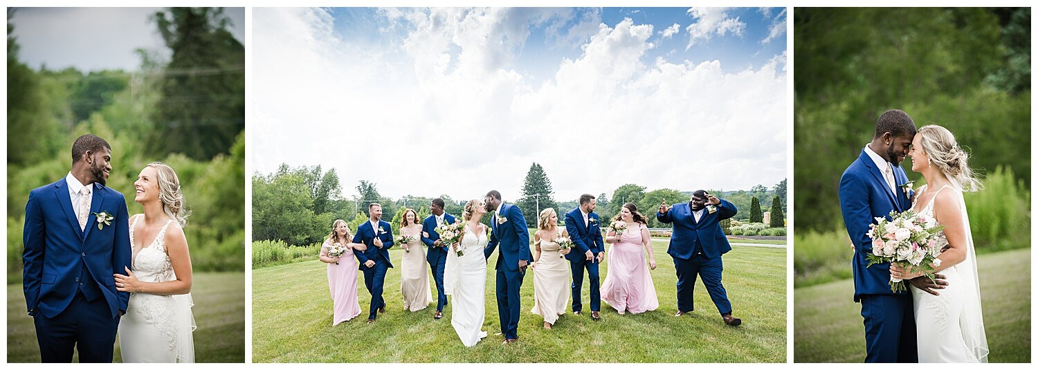  Bridal Party stands around bride and groom during portraits at PA summer wedding 