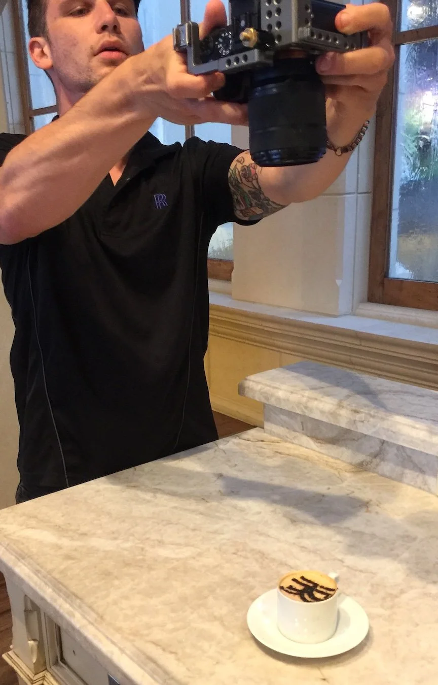 Rolls Royce photographing Conscious Bean's Latte Art