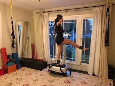 Ballet with weights on a vibration platform.