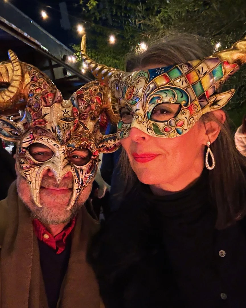 Wearing masks at a KrampusNacht party.