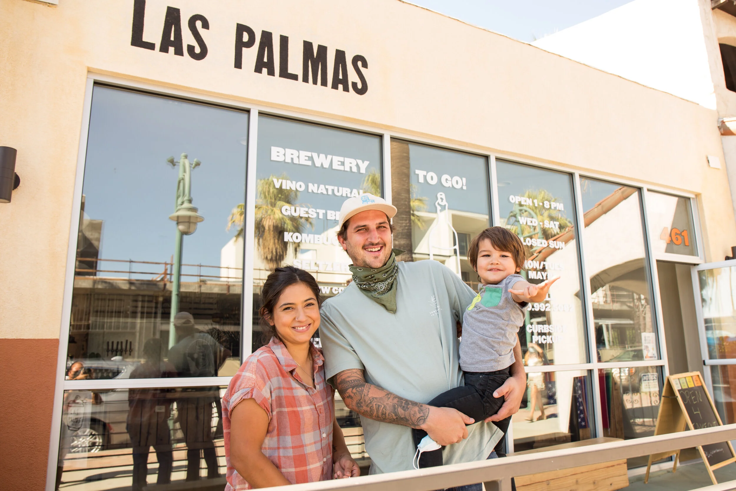 Owners Gardenia Ramirez & Eric Wilson with their baby boy, Koda.