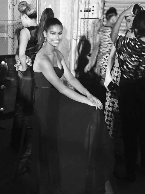 Model Miriam Suka backstage in the Lena Kasparian silk gown.