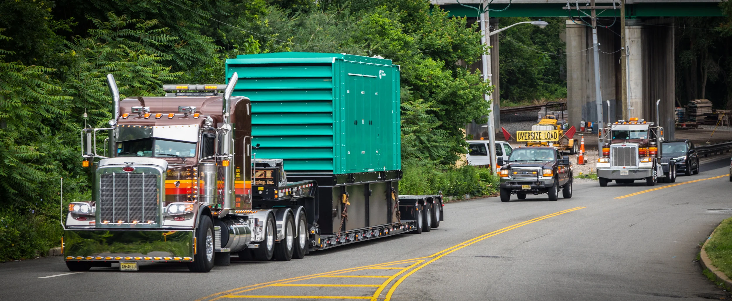 Stephen Izzi Trucking & Rigging.