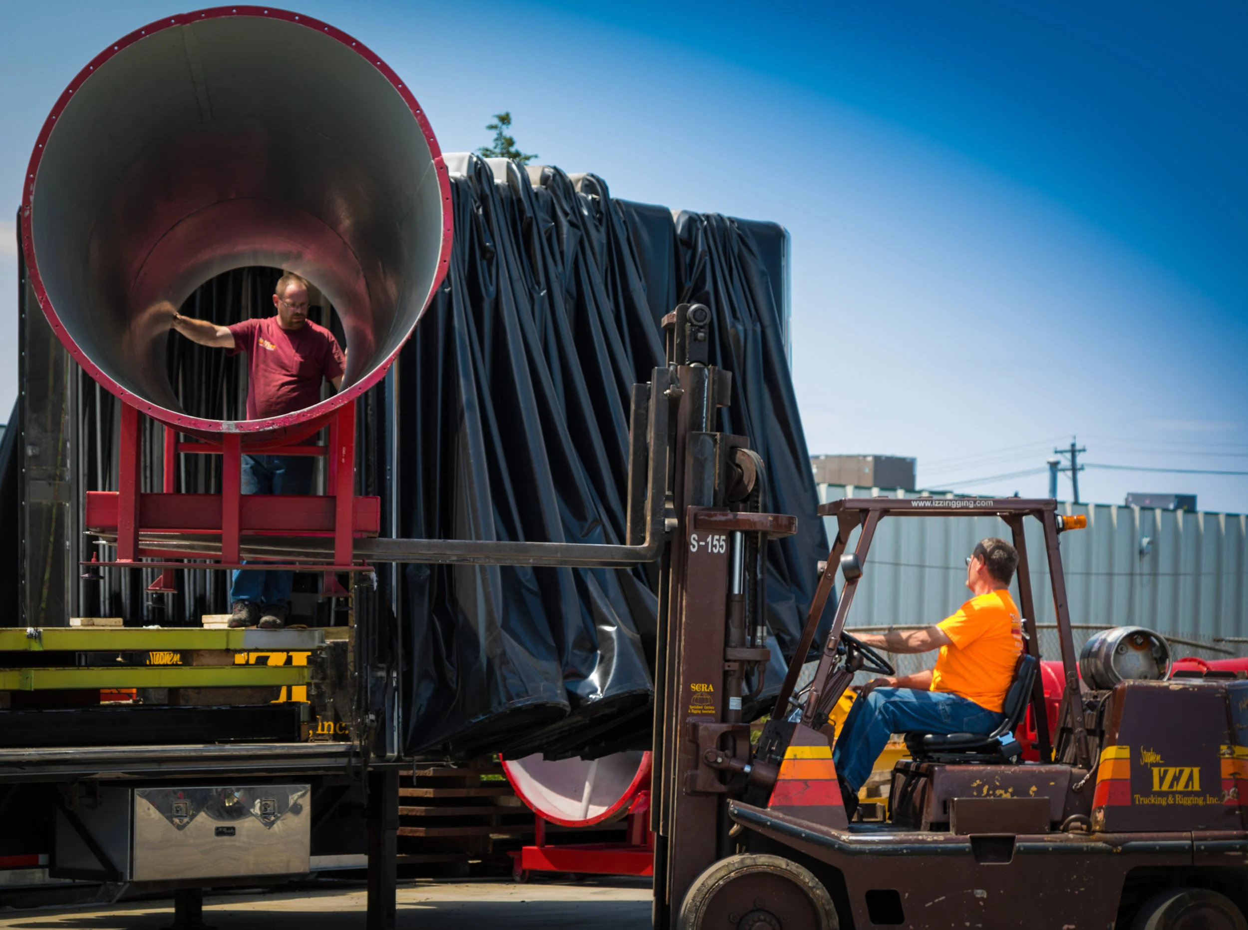 Stephen Izzi Trucking & Rigging.