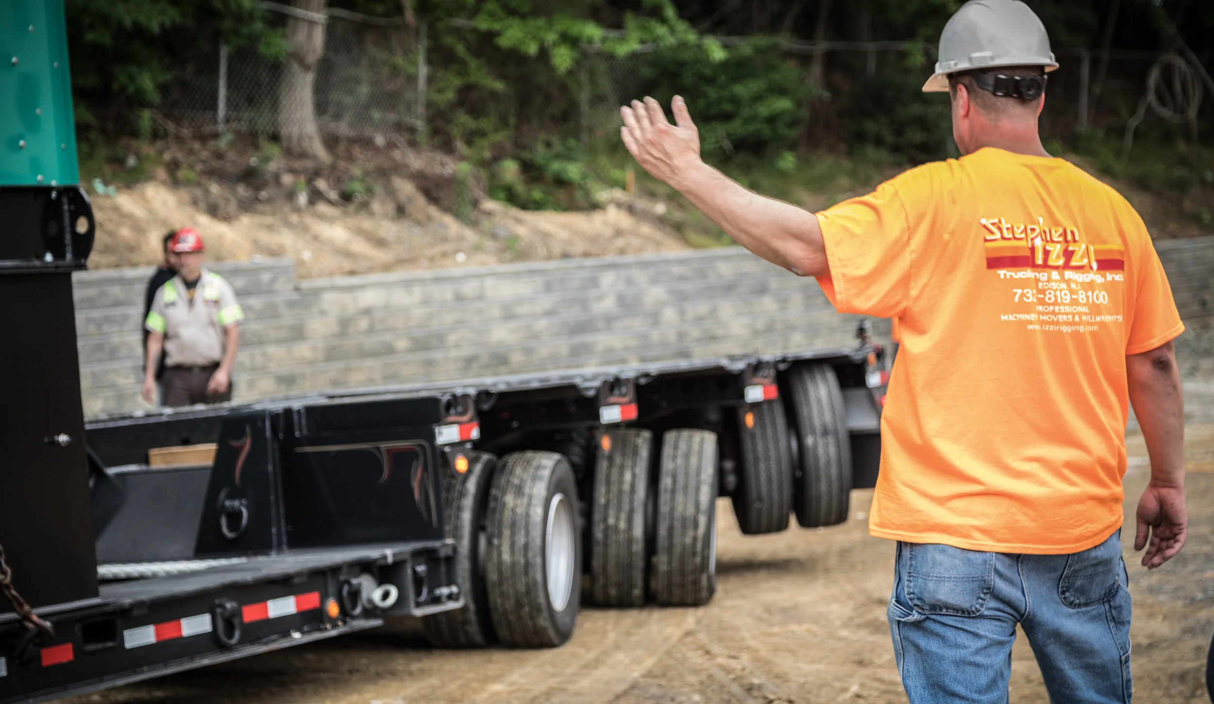 Stephen Izzi Trucking & Rigging.