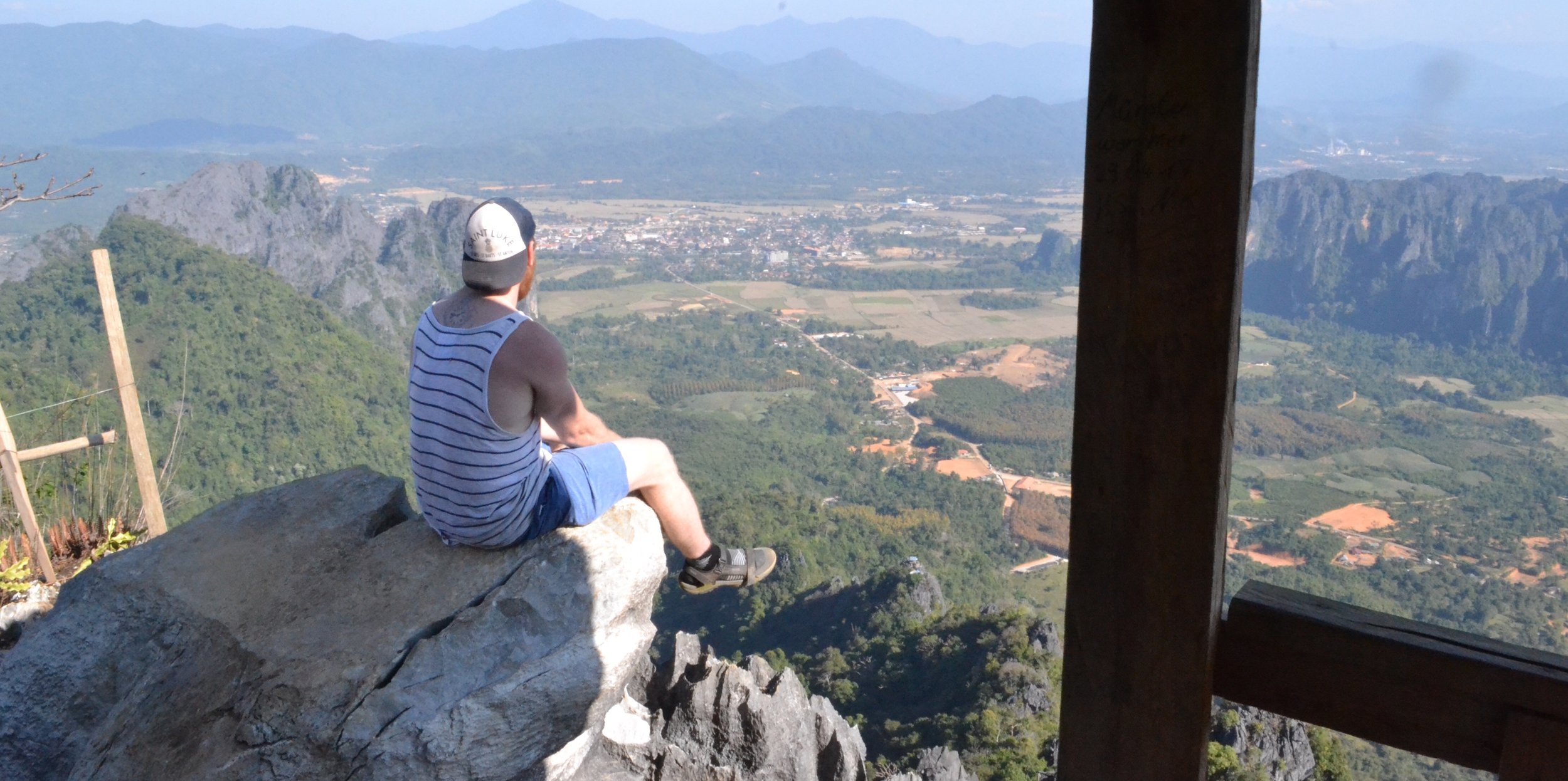 Views from Pha Ngeun mountain over looking Vang Vieng. Trying to over come my fear of heights. 