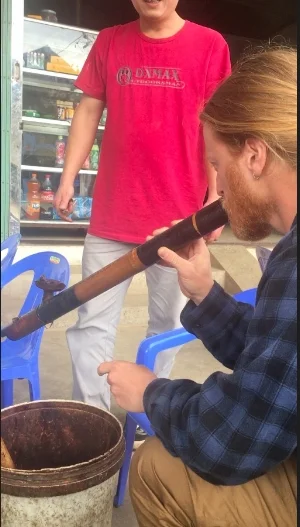 Mike tucking into a local tobbaco pipe