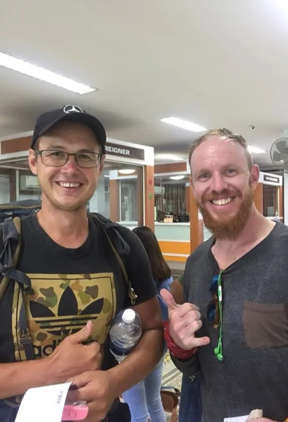 Andrey from Russia hitchhiking his way around Southeast Asia and back to Russia with his girlfriend.