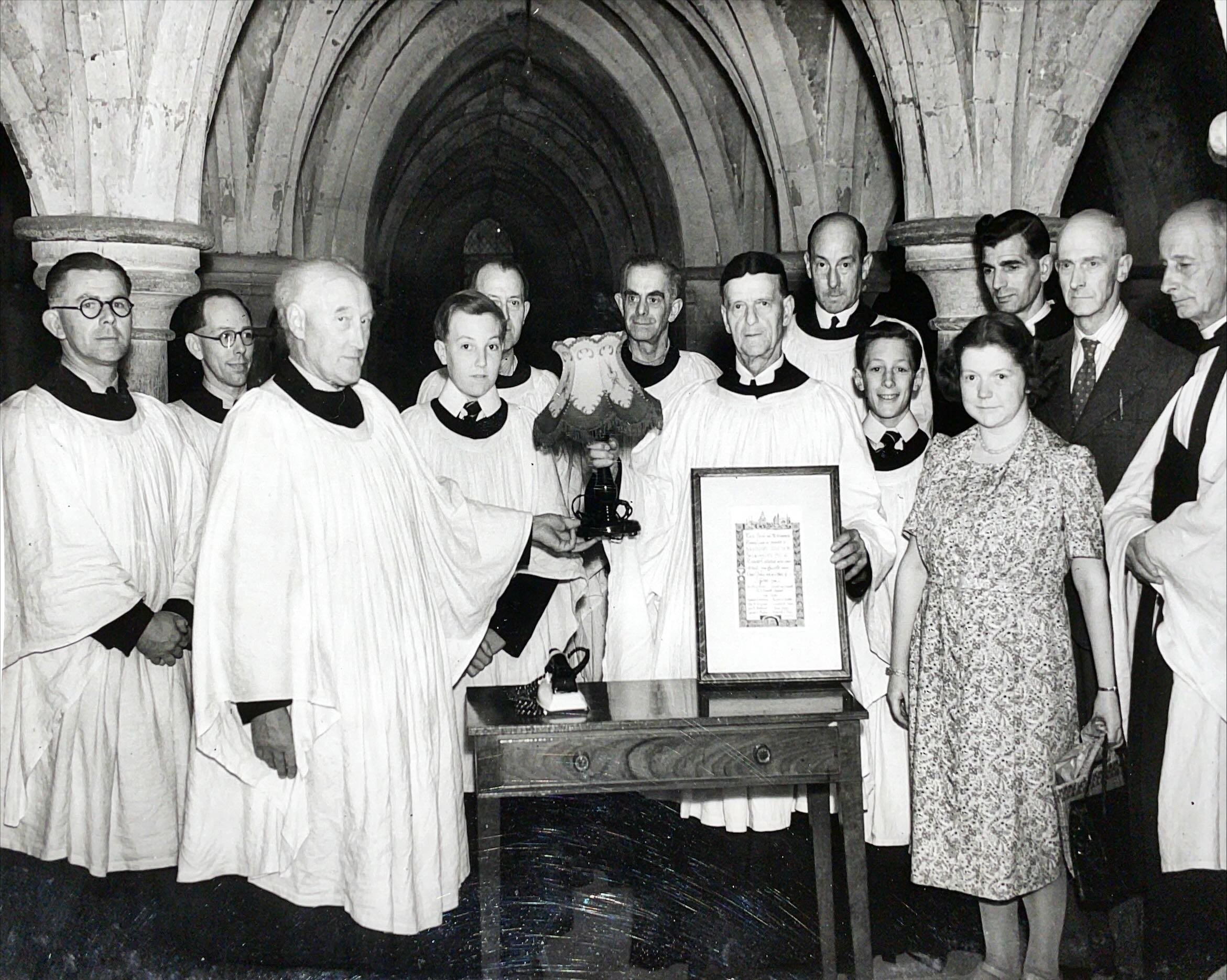 Mr H. C. Wilkins presenting Mr H. Simpson with gifts on retirement after thirty-two years as Lay Clerk, July 1952
