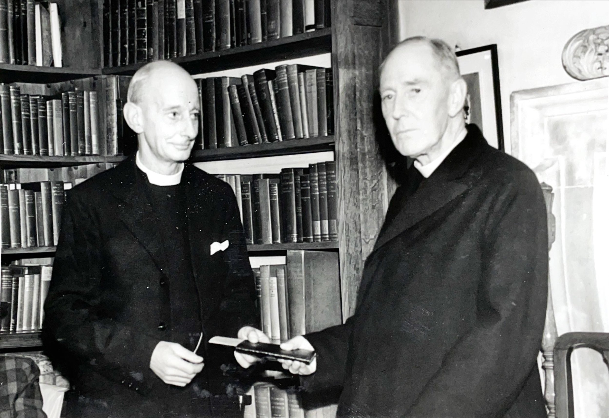 Canon Mackean, Vice Dean, presenting cheque to the Rev. H. G. Welch, Sacrist, on relinquishing appointment, October 1953