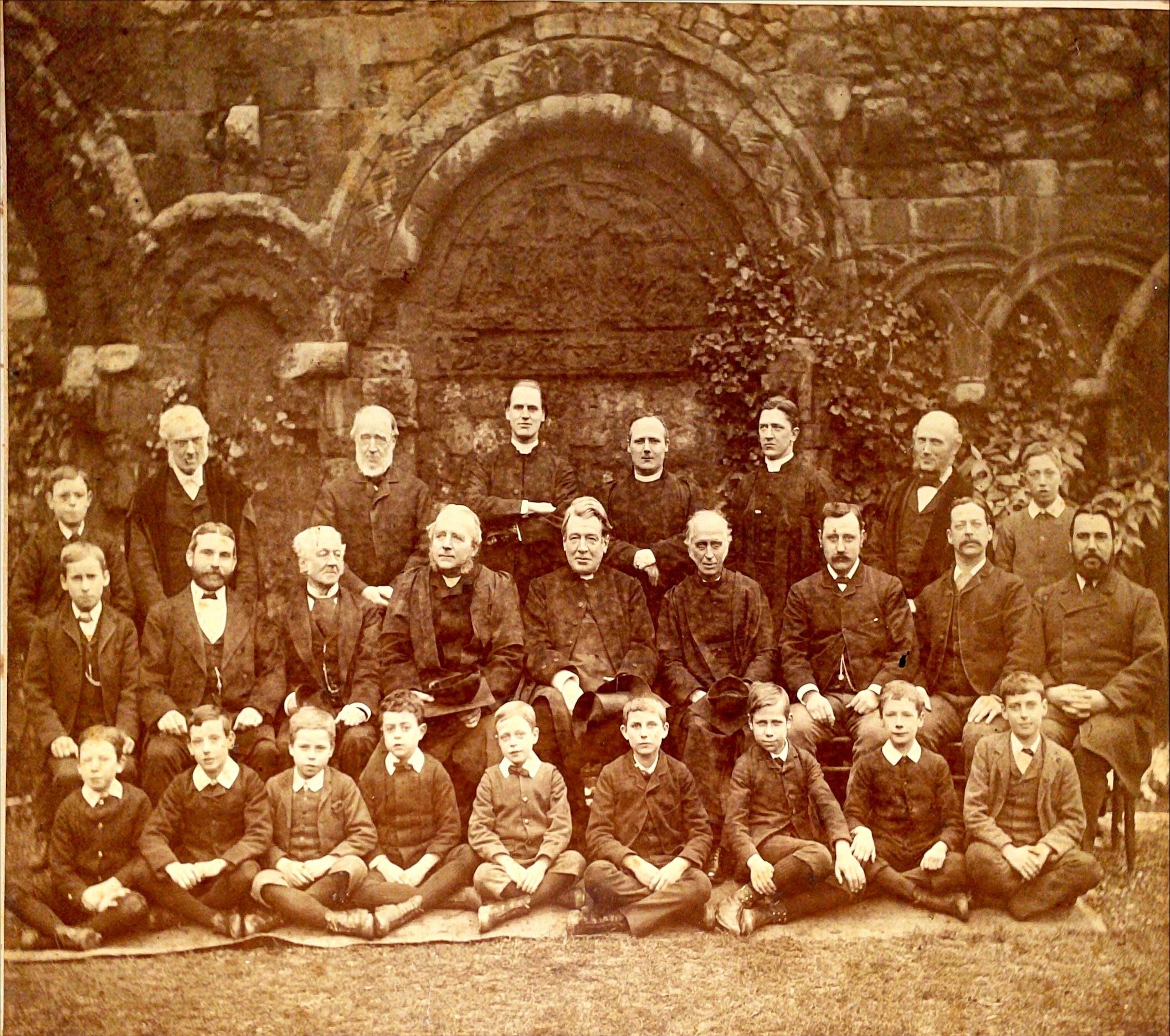 Cathedral clergy and choristers in the Cloister Garth, 1888