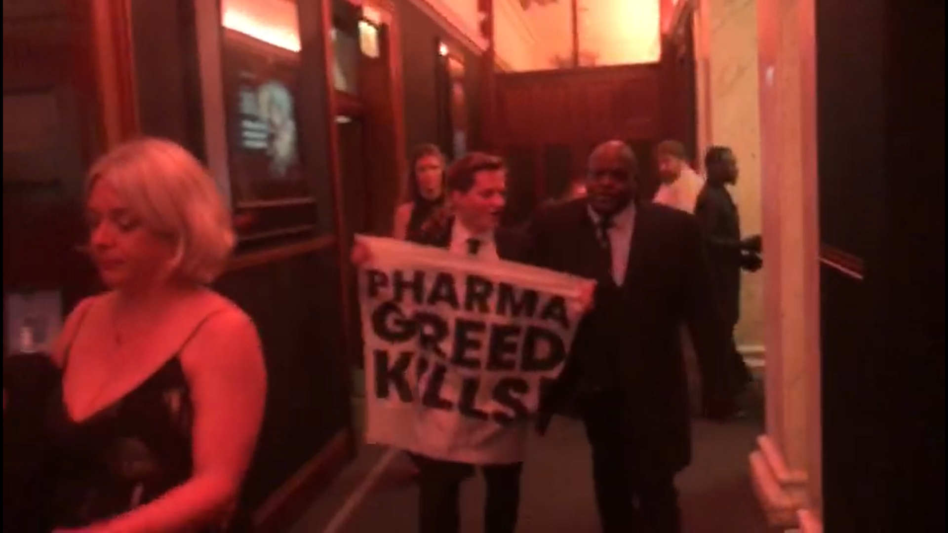 VIDEO: Activists thrown out of Pharma Awards Europe ceremony after storming stage to demand end to pandemic profiteering