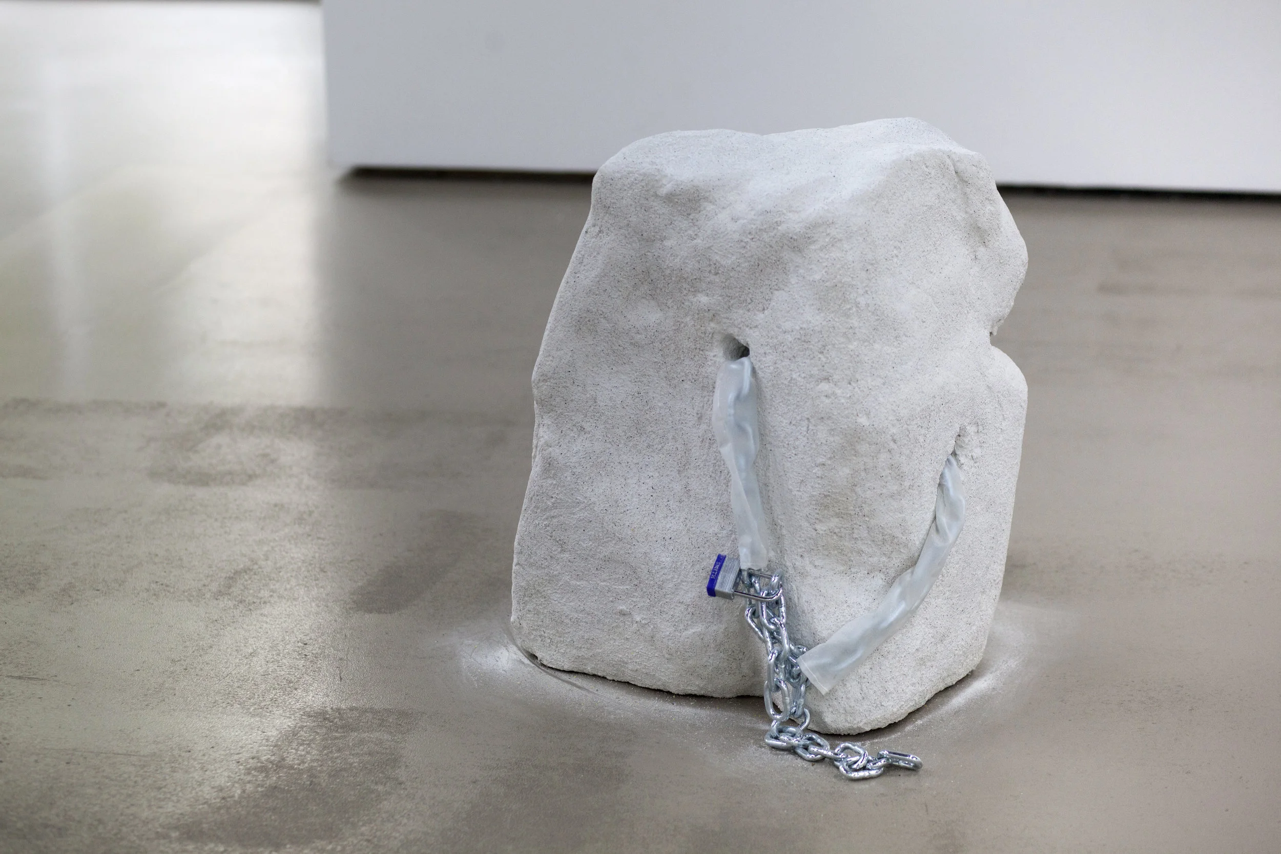 Cooling my heels 2, 60 x 48 x 40 (cm), Jesmonite, padlocks, polystyrene foam, chain and PVC, 2018