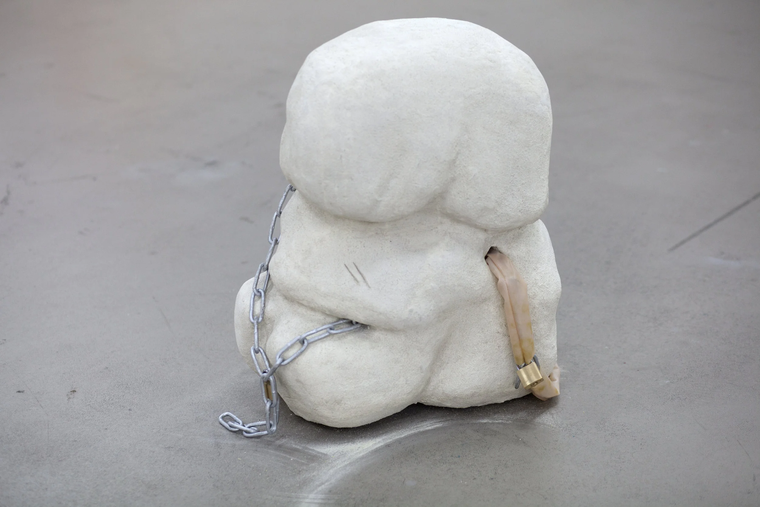 Cooling my heels 3, 58x45x28(cm), Jesmonite, padlocks, polystyrene foam, chain and latex, 2018