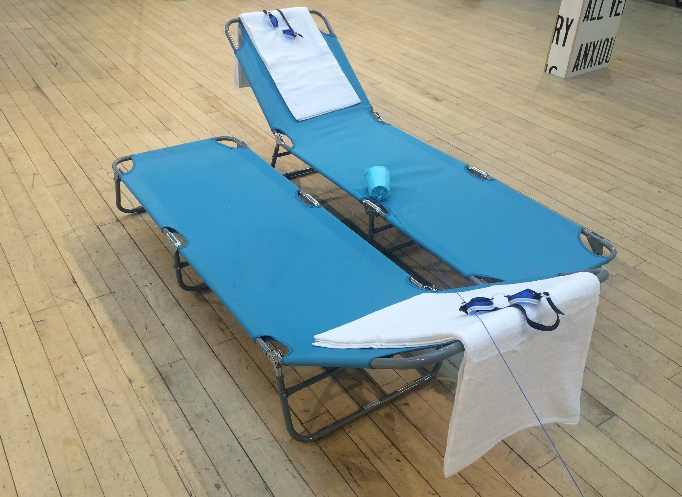 I wish I was swimming, a pair of swimming pool lounger, towel, and swimming goggles, dimension variable, 2016