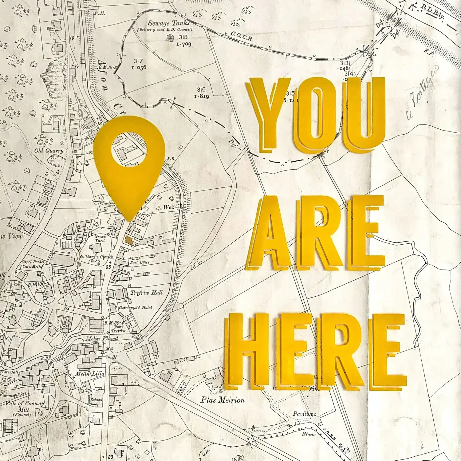 An old map on which are the words YOU ARE HERE in yellow