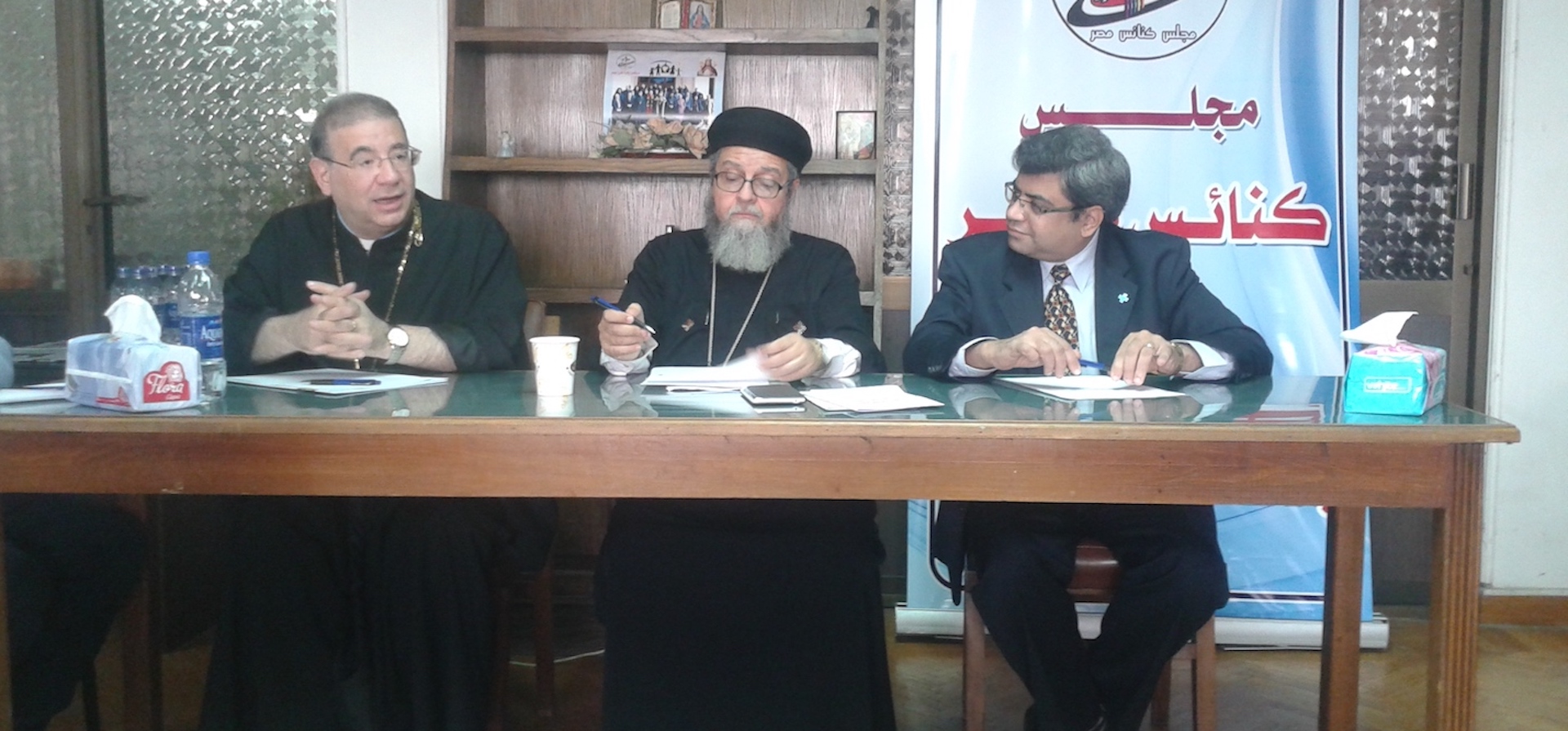 Photo: Father Rafic Greiche, a Catholic priest; Father Bishoy Helmy, an Orthodox priest; and Reverend Rifaat Fikry, a Protestant pastor speak at a meeting of Egypt Council of Churches.