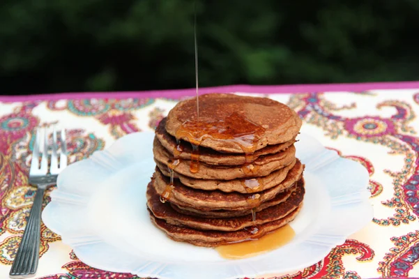 Pecan Flour Buttermilk Pancakes Author: Dédé Wilson Makes: Makes about 12, 3-inch pancakes Ingredients ¾ cup old-fashioned rolled oats (not quick or instant) 1/4 cup Oliver Farm pecan flour 1 tablespoon sugar 1 teaspoon baking powder ½ teaspoon baking soda ¼ teaspoon salt 1 teaspoon vanilla extract 1 cup low-fat or nonfat buttermilk, at room temperature (extra as needed) 1 large egg, at room temperature 1 tablespoon Oliver Farm Pecan Oil Instructions Place all the ingredients in a blender and blend on high speed until smooth. Check batter; it might look loose. Allow to sit for a minute or two; it should thicken up. If it doesn’t, add a tablespoon or more of buttermilk in addition. Heat electric griddle, nonstick pan or cast-iron with a bit of melted butter until a few drops of water dance. Doll out about ¼ to ⅓ cup amounts of batter at a time and cook over medium heat until a few bubbles appear around the edges. The bottoms should be golden. Flip over and cook for a minute or two more. Serve hot with real maple syrup and fruit if desired. Images: Dédé Wilson