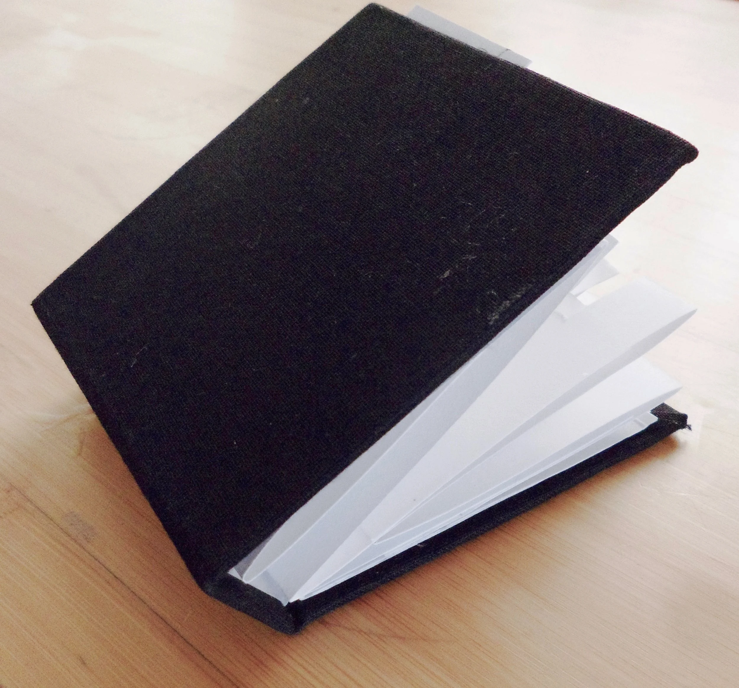 Final book design, square shaped. 