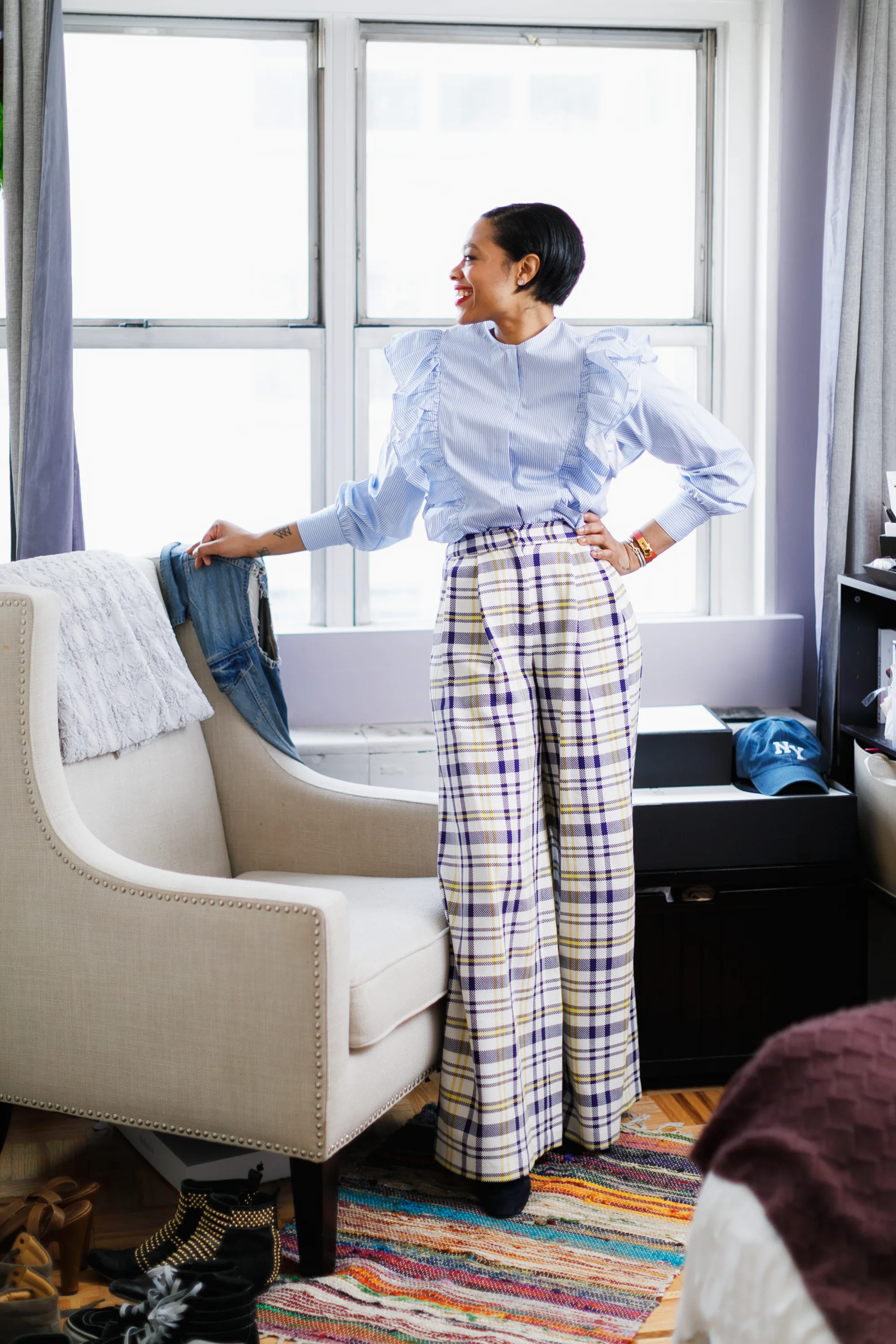 Top: Zara. Pants: Adam Lippes. Shoes: L.K. Bennett. Wrap bracelet: Hermes. Rope bangles: David Yurman.