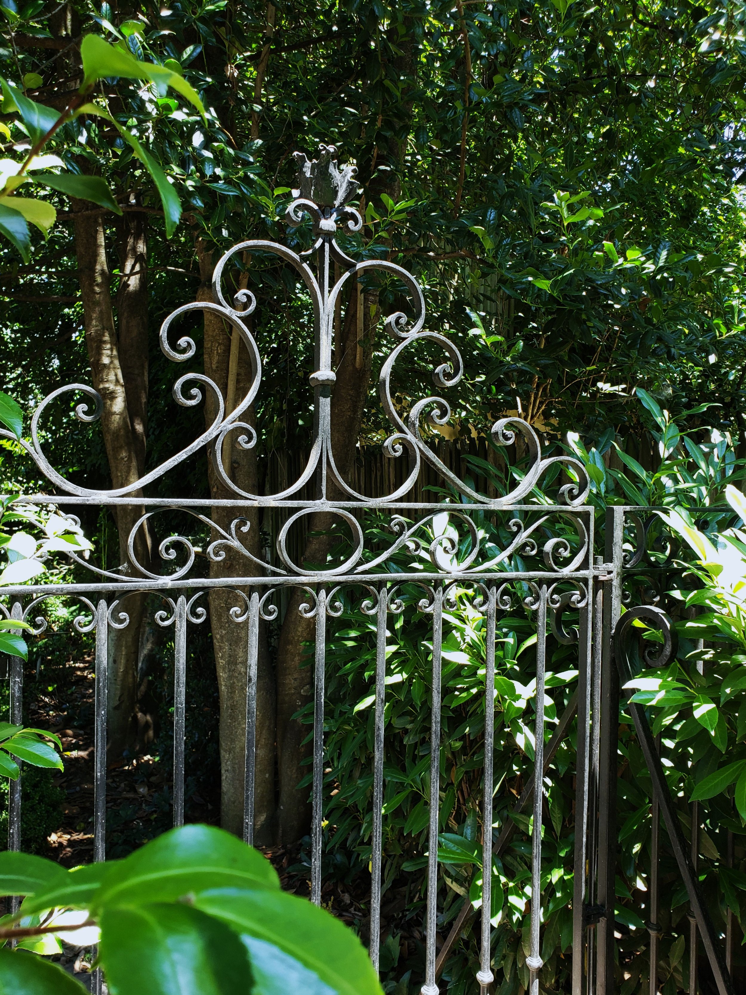 A gate restoration installed at a private residence in DC. Hand forged by Derick Kemper at Damselfly Forge – Damselflyforge.com.jpg